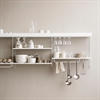 string-system-kitchen-white-beigebackground-closeup_cropped_portrait_large